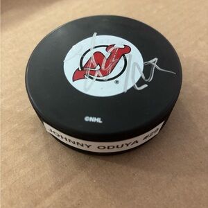 Signed NHL Hockey Puck Johnny Oduya#29